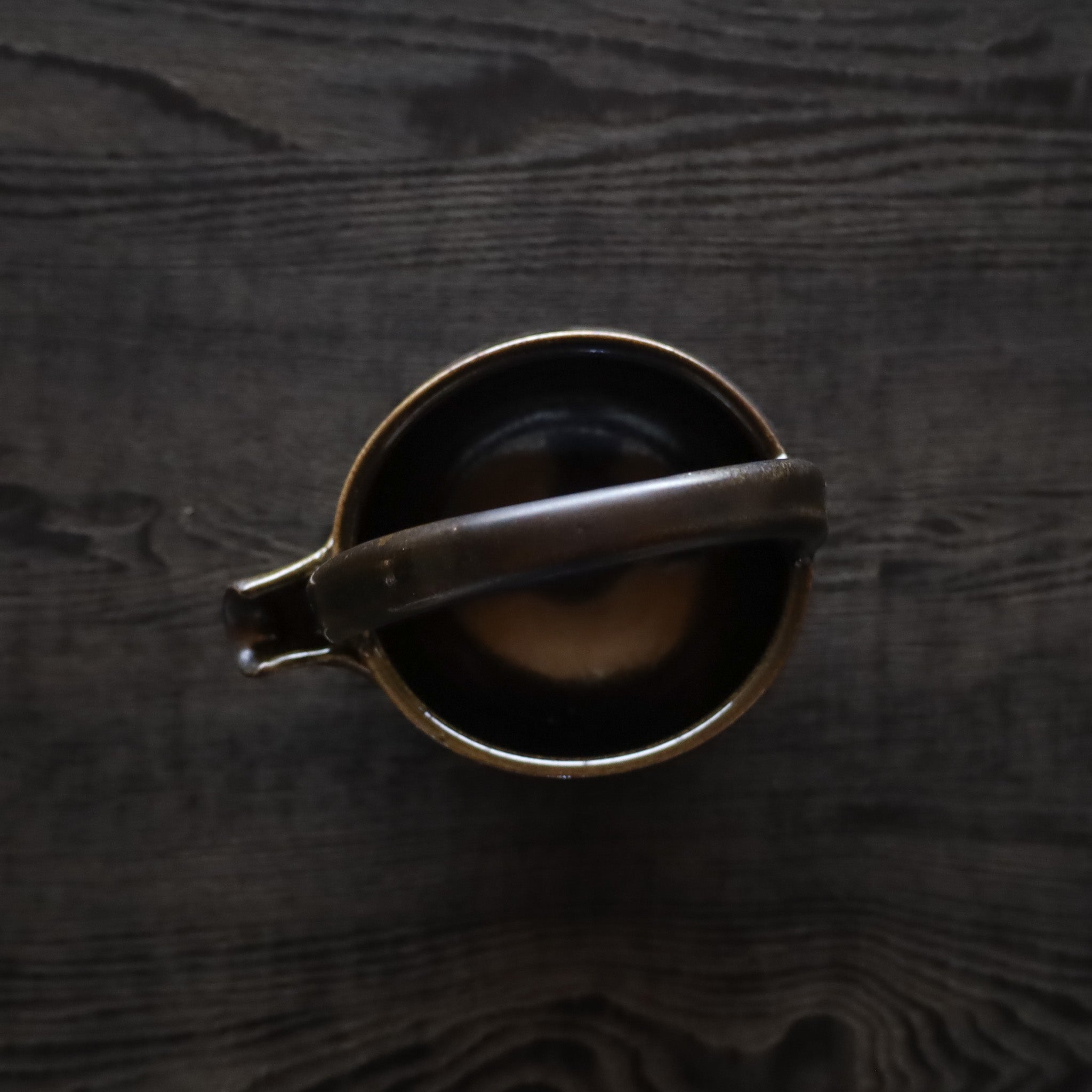 ●26-TY-3 Black Karatsu handled spouted bowl