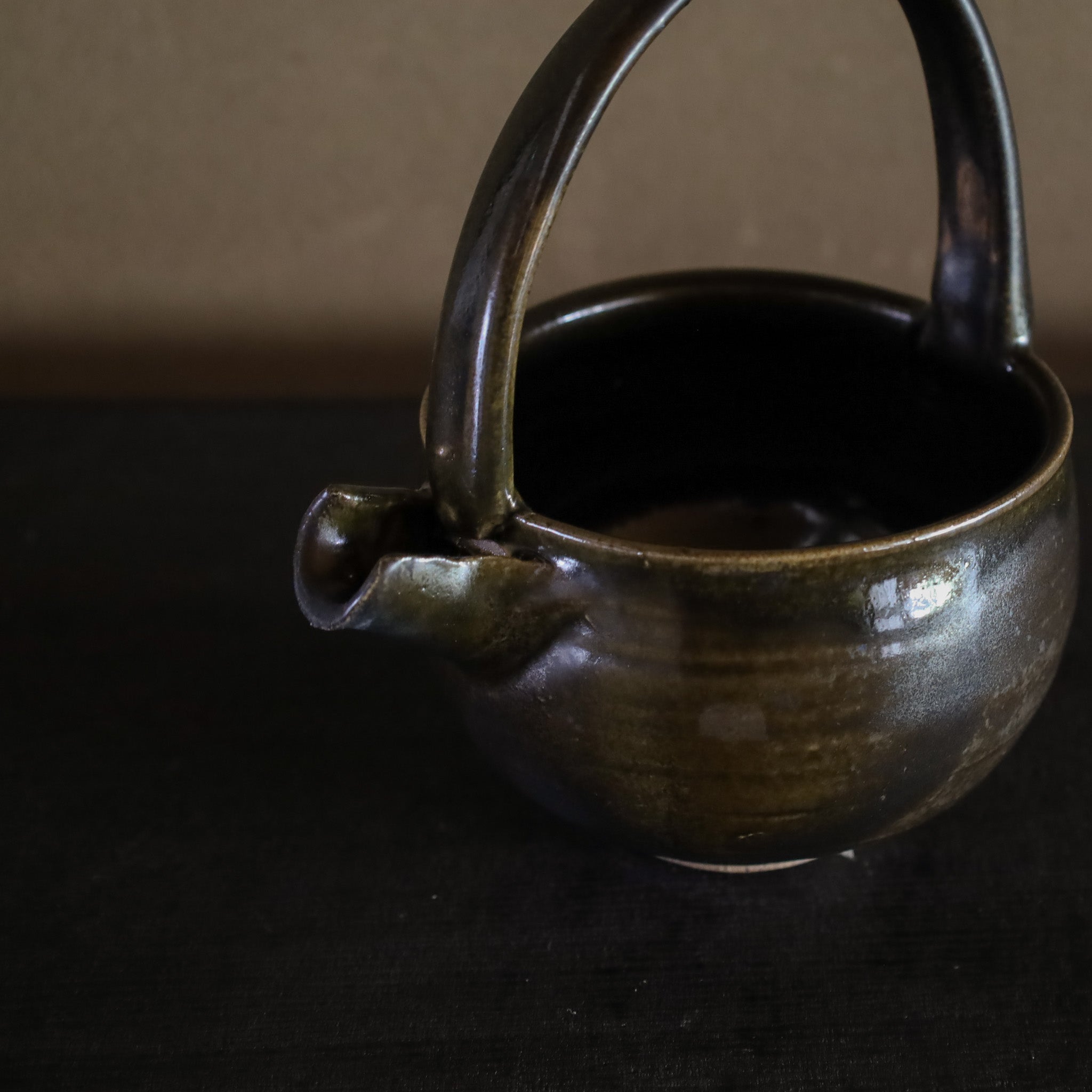 ●26-TY-3 Black Karatsu handled spouted bowl